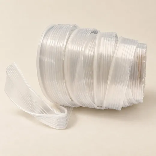 A 35 mm bottom joint zipper profile wound on a core, its joined web visible where a length lifts away.